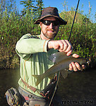 A very nice grayling for this small stream. From Nome Creek in Alaska.