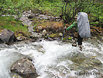 Crossing a tributary of Windy Creek. My waterproof leather boots & Kuiu gaiters kept my feet dry here, but I had less luck in the thigh-deep holes of whitewater in rain-swollen Windy Creek itself a couple hours later. From Clearwater Mountains in Alaska.
