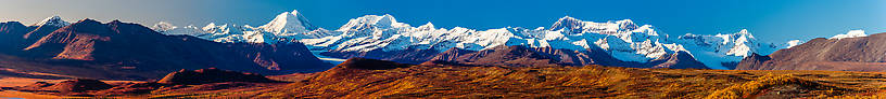 The four tallest peaks (on the horizon, from this perspective), from left to right, I think, are Mt Hayes, 10,065-foot Aurora Peak, and a "double" peak that is actuall Mt Shand (left/foreground) with the peak of Mt Moffit sticking up in the background to the right of it From Denali Highway in Alaska.