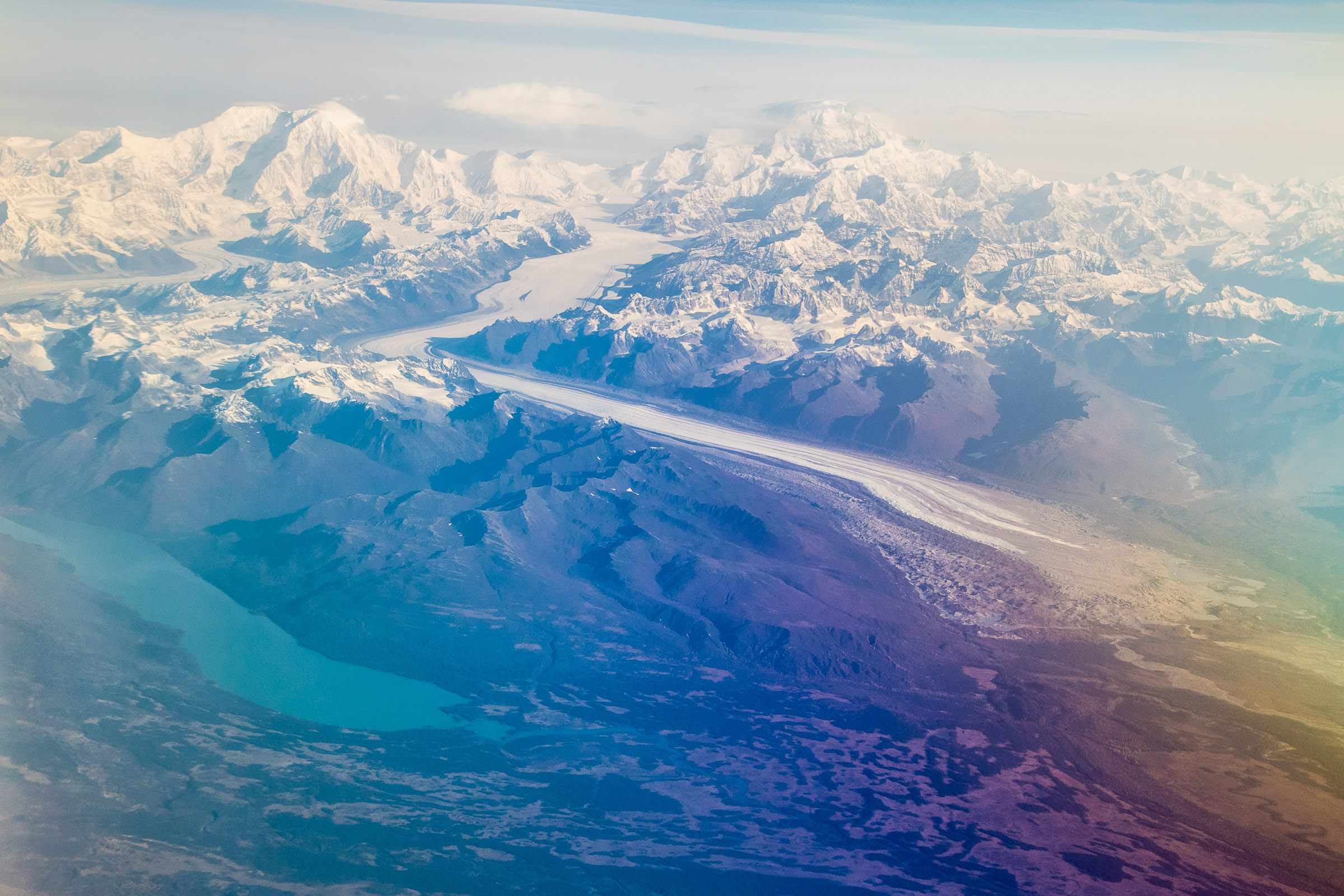 Mt Foraker (left), Denali (right), Kahiltna Glacier, and Chelatna Lake, the outlet of which (Lake Creek) is known for great fishing and difficult floating. Viewed from a flight from Kotzebue to Anchorage. From Denali National Park in Alaska.