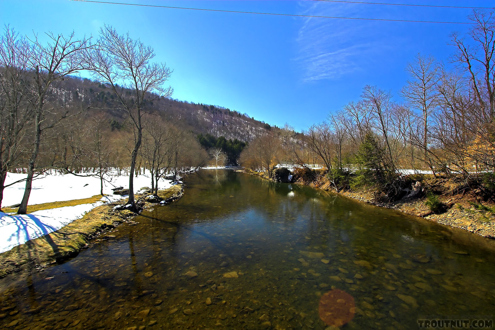 I love how clear the water can be in the Catskills when it hasn't rained for a little while.  A polarizing filter (or sunglasses!) helps, too. From Willowemoc Creek in New York.