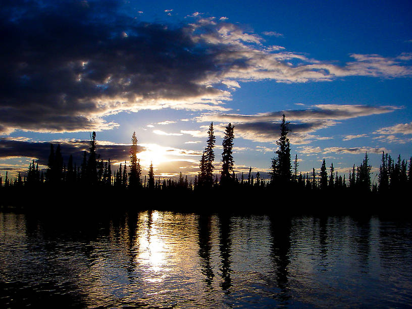 The sun slooowly sets over a crystal-clear grayling stream. From the Delta Clearwater River in Alaska.